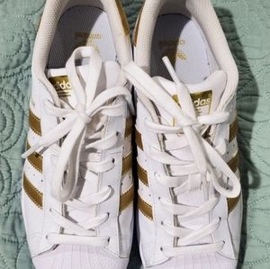 Adidas superstar white and gold shoes